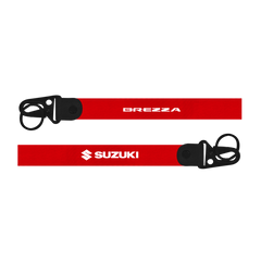 Two red straps with 'Brezza' and 'Suzuki' logos on a white background