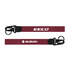 Two red lanyards with 'Eeco' and 'Suzuki' logos on a white background
