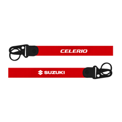 Two red lanyards with 'Celerio' and 'Suzuki' logos on a white background