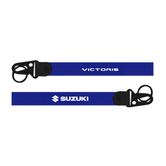 Two blue lanyards with 'Victoris' and 'Suzuki' logos on a white background