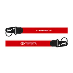 Red lanyard with Toyota and Camry logos on a white background