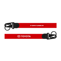Red lanyard with Toyota and Fortuner branding on a white background