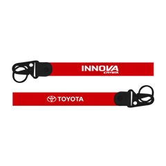 Two red lanyards with 'Innova' and 'Toyota' logos on a white background