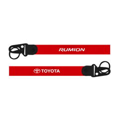 Red lanyard with 'Rumion' and 'Toyota' logos on a white background