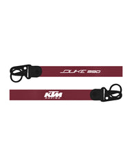 Two maroon straps with black buckles and 'KTM Racing' branding on a white background.