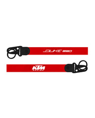 Red lanyard with 'KTM Racing' and 'Duke 250' text on a white background