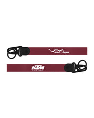 Two KTM Racing straps with black buckles on a white background