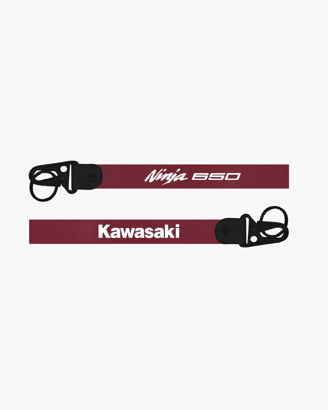 Two motorcycle exhaust pipes with 'Ninja 650' and 'Kawasaki' branding on a white background.