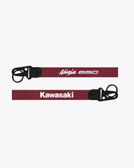 Two motorcycle exhaust pipes with 'Ninja 650' and 'Kawasaki' branding on a white background.