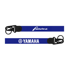 Two blue straps with 'Yamaha' and 'Fascino' branding on a white background keychain