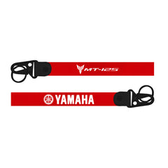 Red lanyard with Yamaha logo on a white background