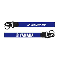Blue  bike keychain with 'Yamaha' and 'R25' branding on a white background