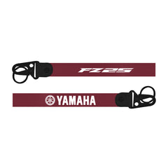 Maroon lanyard with Yamaha and Fz25 logos on a white background