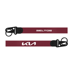 Two red lanyards with 'Seltos' and 'Kia' logos on a white background