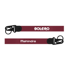 Two keychains with 'Bolero' and 'Mahindra' branding on a white background