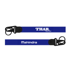 Two blue lanyards with 'THAR' and 'Mahindra' branding on a white background