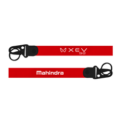 Red lanyard with 'XEV' and 'Mahindra' branding on a white background