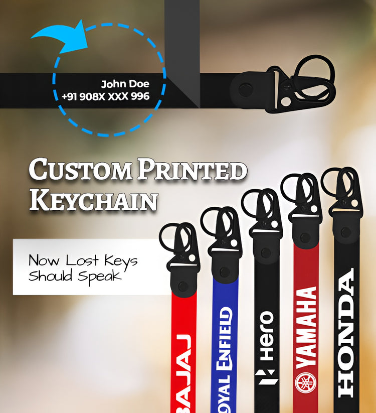 Custom printed keychain with brand logos and contact information on a blurred background