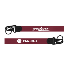 Maroon lanyard with 'Pulsar NS160' and 'Bajaj' branding on a white background