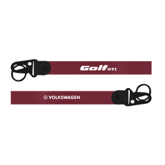 Two maroon lanyards with black buckles and text on a white background